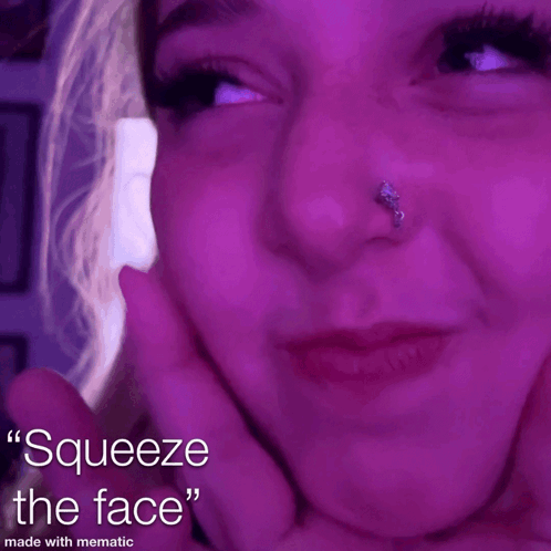 A Close Up Of A Woman 'S Face With The Words Squeeze The Face Made With Mematic GIF