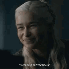 A Close Up Of A Woman 'S Face With The Words Sweeping Protections On The Bottom GIF