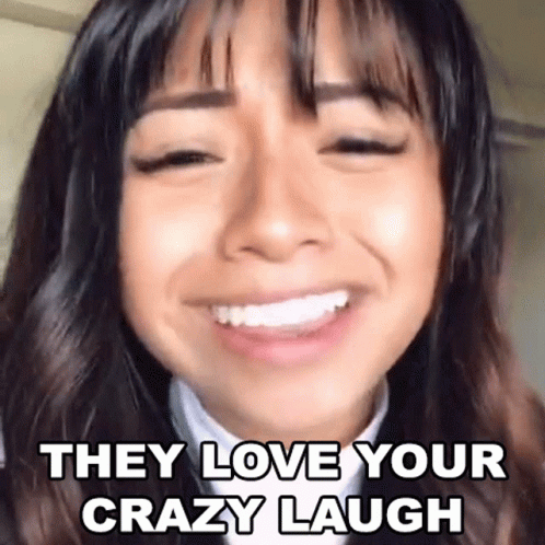 A Close Up Of A Woman 'S Face With The Words `` They Love Your Crazy Laugh '' On It . GIF