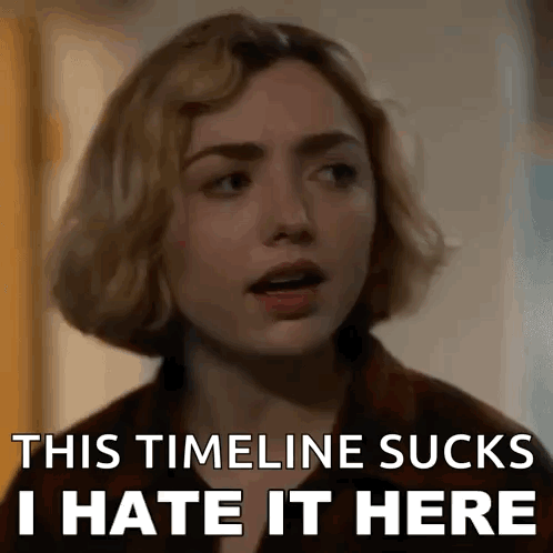 A Close Up Of A Woman 'S Face With The Words `` This Timeline Sucks I Hate It Here '' . GIF