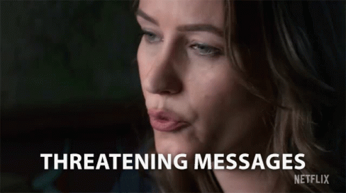 A Close Up Of A Woman 'S Face With The Words Threatening Messages Written On The Bottom GIF