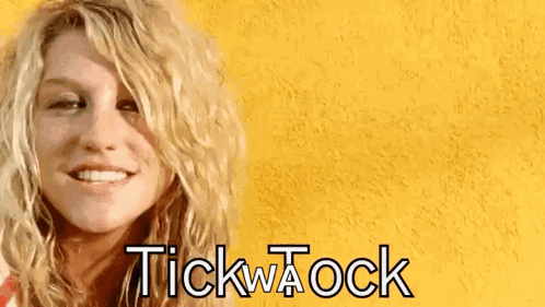 A Close Up Of A Woman 'S Face With The Words Tick A Ock Written On It GIF