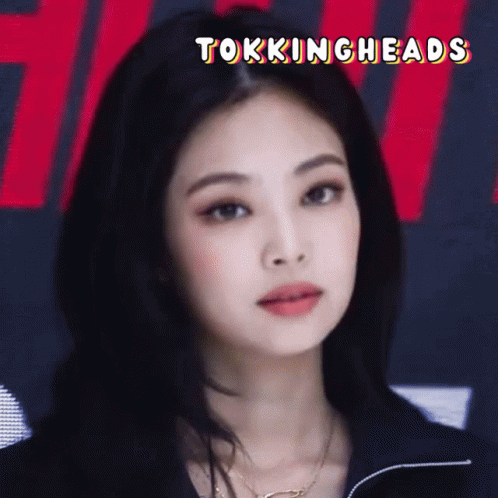 A Close Up Of A Woman 'S Face With The Words " Tokingheads " Above Her GIF