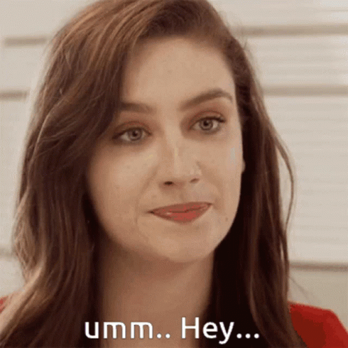 A Close Up Of A Woman 'S Face With The Words Umm Hey On The Bottom GIF