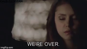 A Close Up Of A Woman 'S Face With The Words `` We 'Re Over '' Written On It . GIF