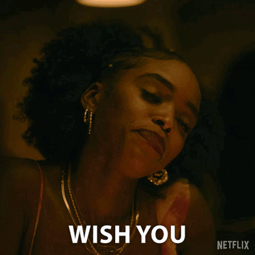 A Close Up Of A Woman 'S Face With The Words " Were Here " Written On The Bottom GIF