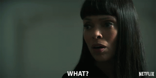 A Close Up Of A Woman 'S Face With The Words What Netflix On The Bottom Right GIF