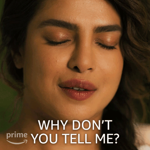 A Close Up Of A Woman 'S Face With The Words " Why Don 'T You Tell Me " GIF