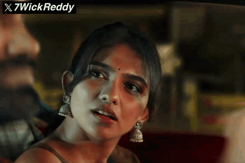 A Close Up Of A Woman 'S Face With The Words X7wickreddy Written Above Her GIF