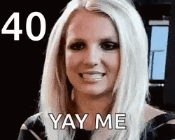 A Close Up Of A Woman 'S Face With The Words `` Yay Me '' Written On It . GIF