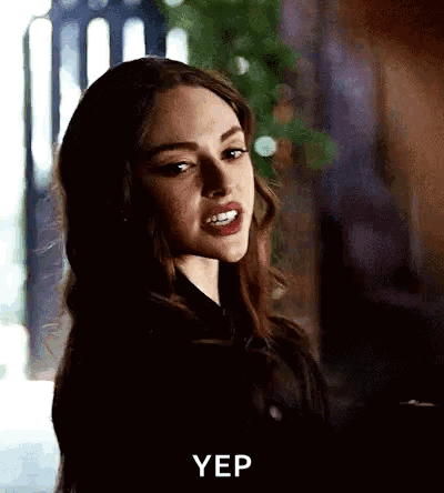 A Close Up Of A Woman 'S Face With The Words Yep Written On The Bottom . GIF
