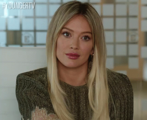 a close up of a woman 's face with the words youngertv written on the bottom