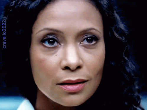 A Close Up Of A Woman 'S Face With The Year 2022 Visible GIF