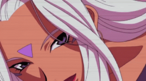 A Close Up Of A Woman 'S Face With White Hair And A Purple Triangle On Her Forehead GIF