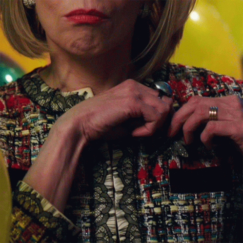 A Close Up Of A Woman 'S Hands With A Ring On Her Finger GIF