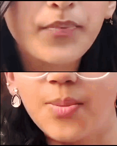 A Close Up Of A Woman 'S Lips With Glasses On GIF