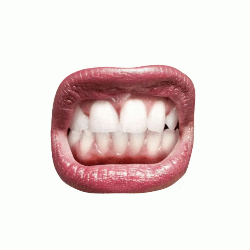 A Close Up Of A Woman 'S Mouth With A White Background GIF