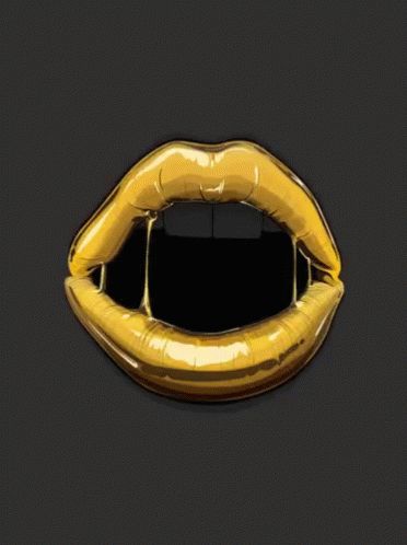 A Close Up Of A Woman 'S Mouth With Gold Lips GIF