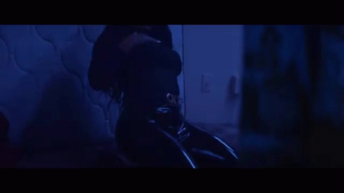 A Close Up Of A Woman 'S Mouth With Two Razor Blades In It GIF