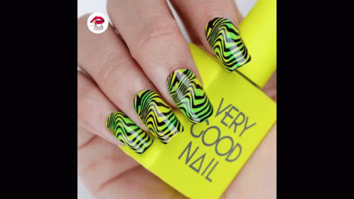 A Close Up Of A Woman 'S Nails With A Very Good Nail Polish GIF