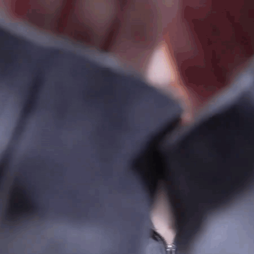 A Close Up Of A Woman Taking A Selfie With A Camera . GIF