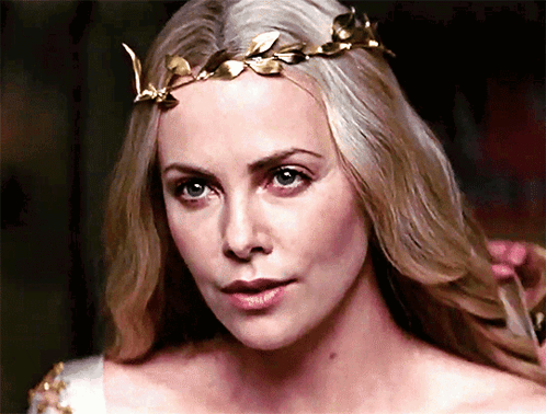 A Close Up Of A Woman Wearing A Crown GIF