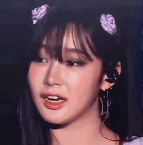 Close Up Of Woman With Flower In Hair GIF