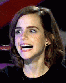 A Close Up Of A Woman With A Surprised Look On Her Face GIF