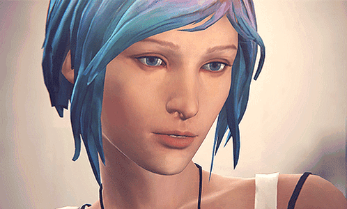 A Close Up Of A Woman With Blue Hair And Blue Eyes GIF