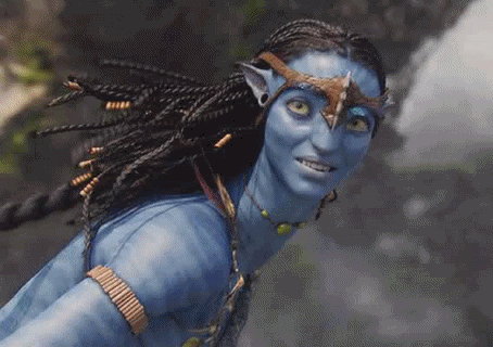 A Close Up Of A Woman With Blue Paint On Her Face And Braids . GIF