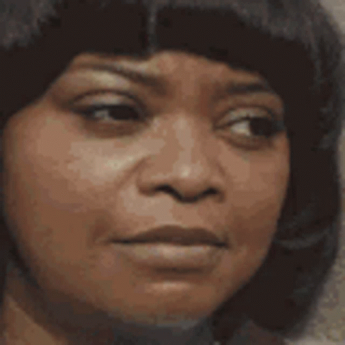 A Close Up Of A Woman With Her Eyes Closed Smiling . GIF