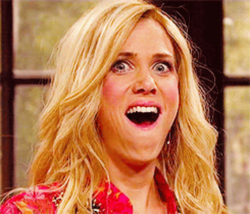 A Close Up Of A Woman With Her Mouth Open GIF