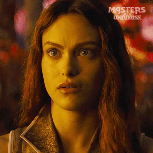 A Close Up Of A Woman With Masters Of The Universe Written On The Bottom GIF