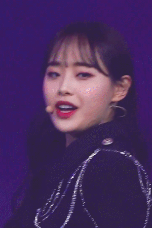 A Close Up Of A Woman With Red Lipstick On Her Lips GIF