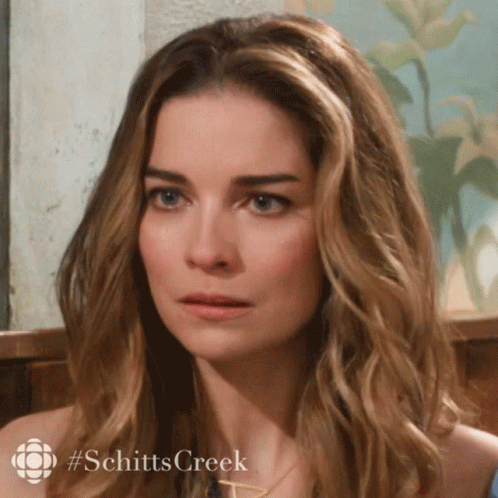 Close Up Of Woman With #Schittscreek Text GIF