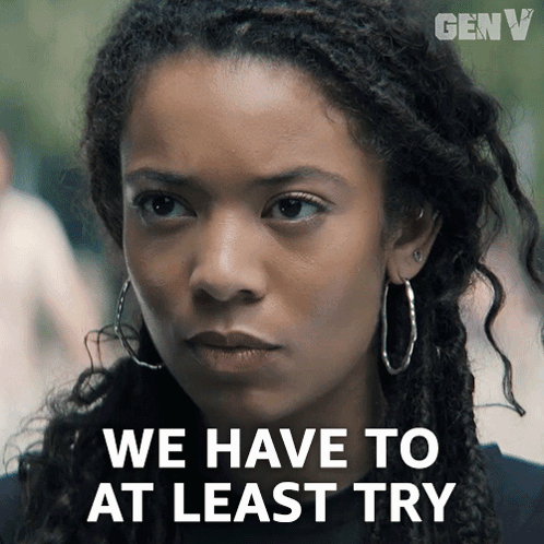 A Close Up Of A Woman With The Words We Have To At Least Try GIF