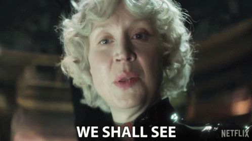 A Close Up Of A Woman With The Words We Shall See Behind Her GIF