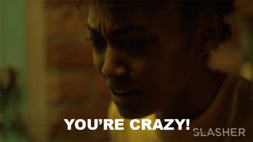 A Close Up Of A Woman With The Words You 'Re Crazy GIF