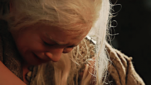 A Close Up Of A Woman With White Hair GIF