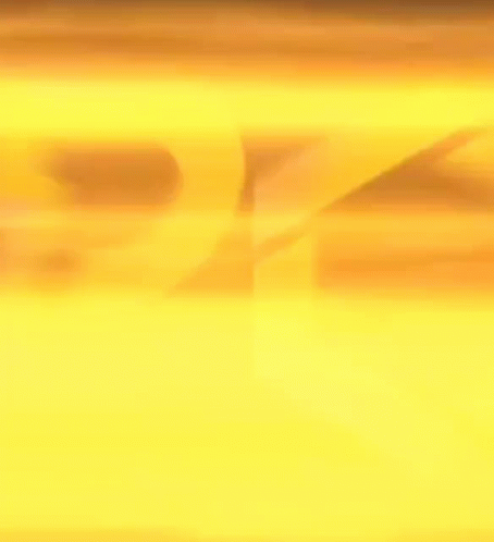 A Close Up Of A Yellow Sign That Says Pk On A Black Background . GIF