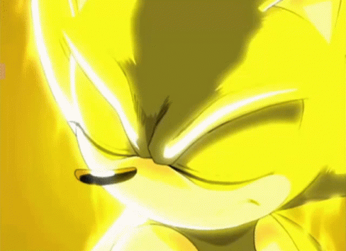 A Close Up Of A Yellow Sonic The Hedgehog 'S Face With A Yellow Background . GIF