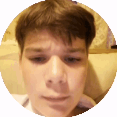 A Close Up Of A Young Boy 'S Face In A Circle GIF