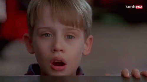 A Close Up Of A Young Boy 'S Face With The Words Kenh Hd On The Bottom Right GIF