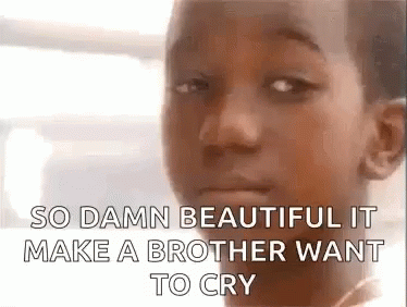 A Close Up Of A Young Boy 'S Face With The Words `` So Damn Beautiful It Make A Brother Want To Cry '' . GIF