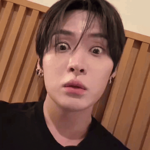 A Close Up Of A Young Man Making A Funny Face . GIF