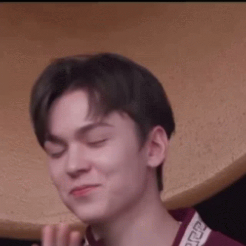 A Close Up Of A Young Man Making A Funny Face . GIF