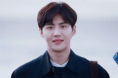 A Close Up Of A Young Man 'S Face With A Caption That Starts With The Letters T And K GIF