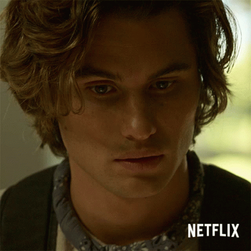 A Close Up Of A Young Man 'S Face With A Netflix Logo In The Corner GIF