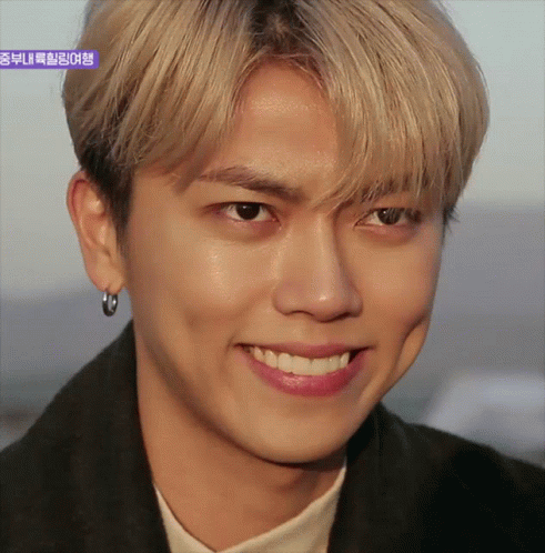 A Close Up Of A Young Man 'S Face With A Purple Border That Says ' Korean ' On It GIF