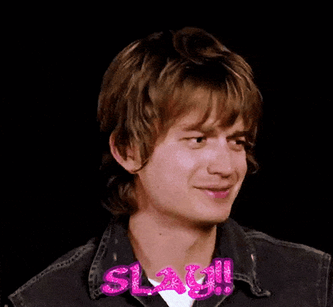 A Close Up Of A Young Man 'S Face With The Word Slay Written On His Neck . GIF